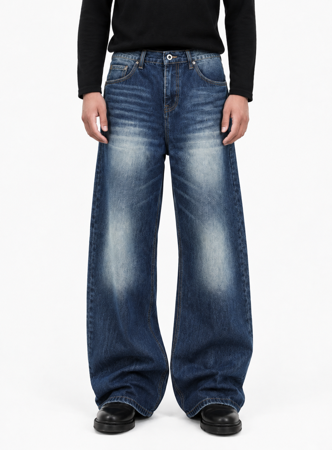 Halden Wide Straight — worn on model with a black long-sleeve top, the wide leg falling over black boots