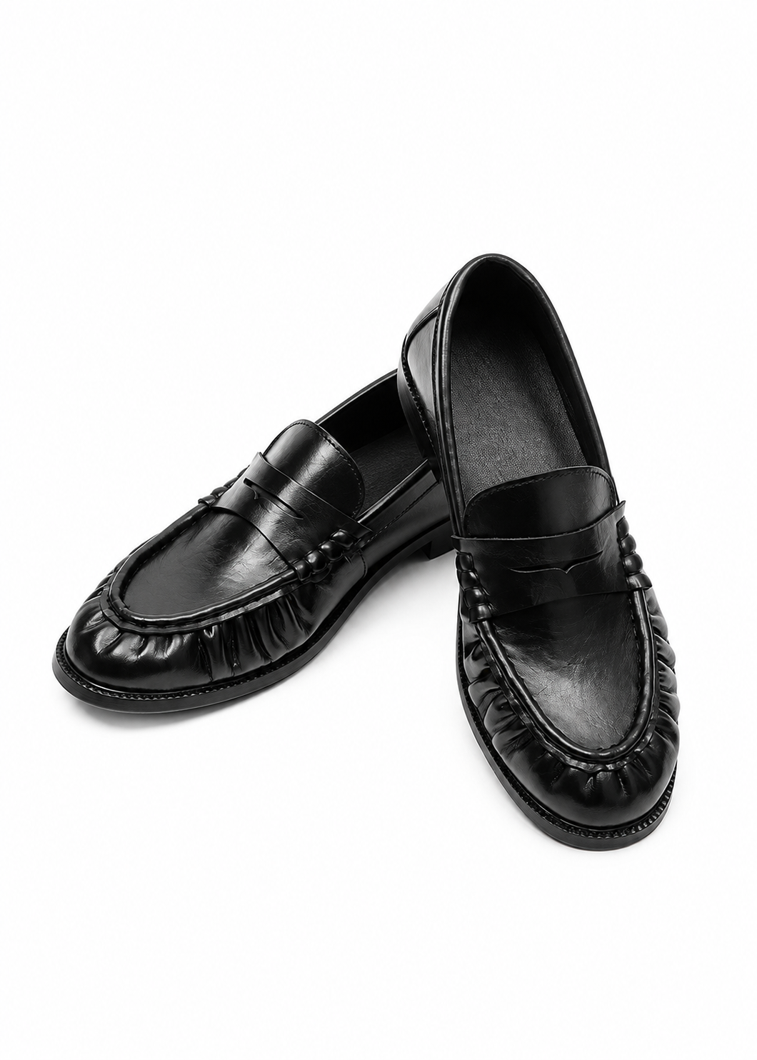 Bracken Loafer — overhead view of the pair, one shoe resting on the other
