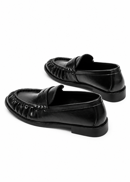Bracken Loafer — rear three-quarter view showing the low stacked heel