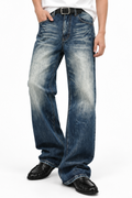 Tarn Loose Straight — worn on model with a belt, faded blue loose straight jeans over black loafers