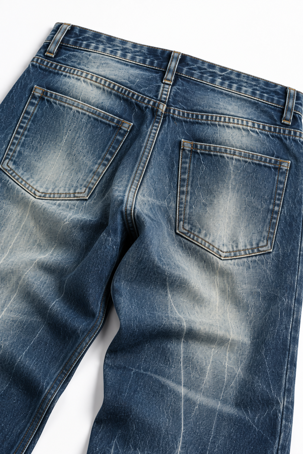 Tarn Loose Straight — back pocket detail on faded blue denim